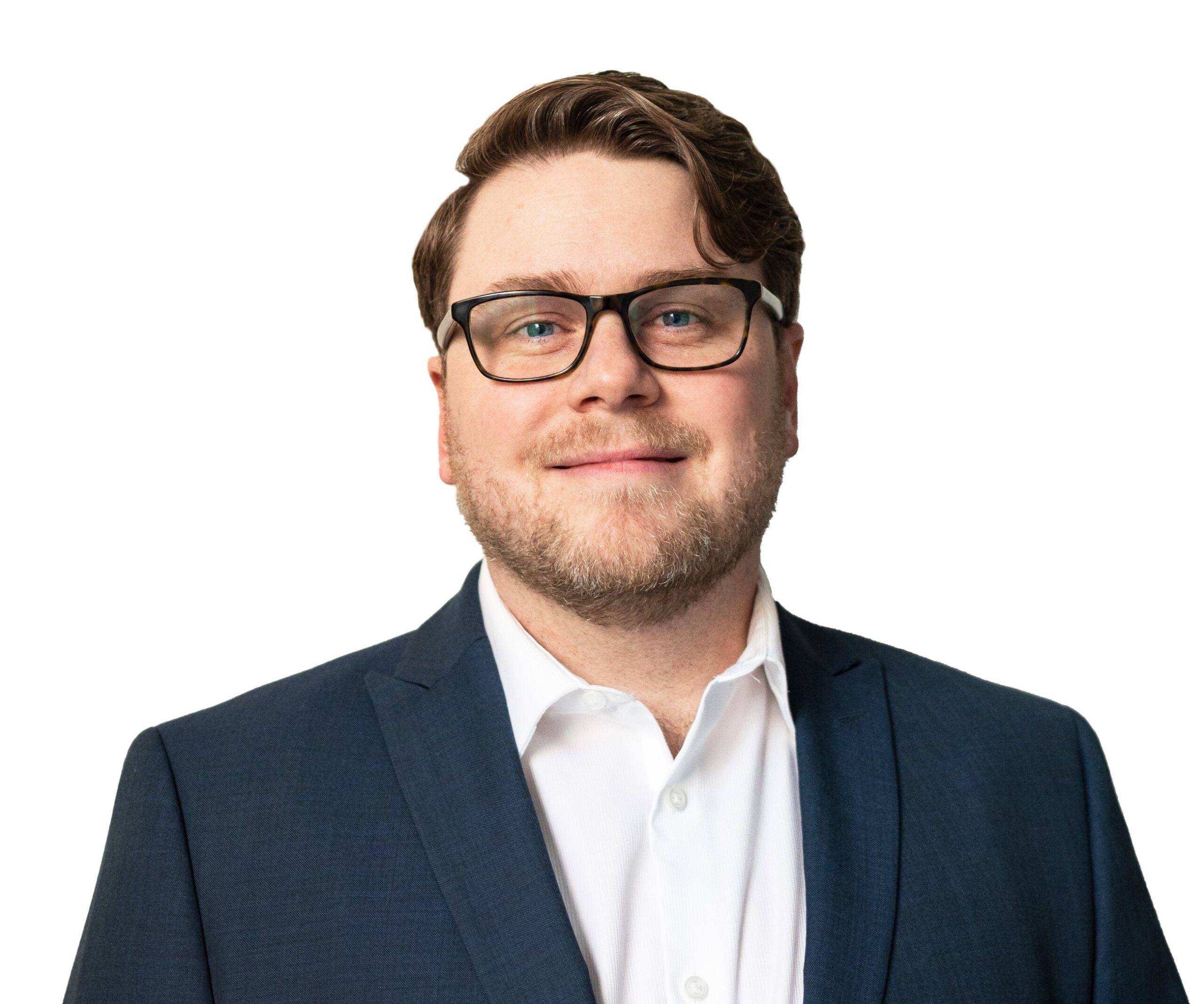 James Headshot 2023 A photography of James MacKinnon.